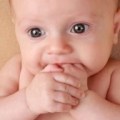 4810137-portrait-of-a-cute-caucasian-baby-girl-beige-background